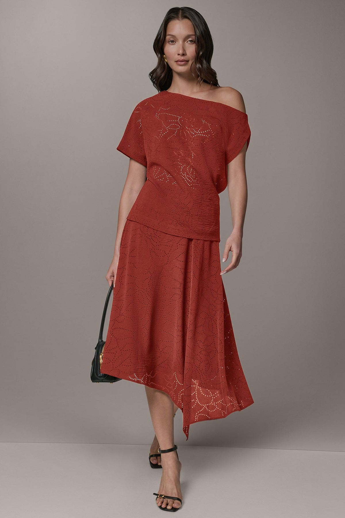 LASER CUT ASYMMETRIC MIDI SKIRT