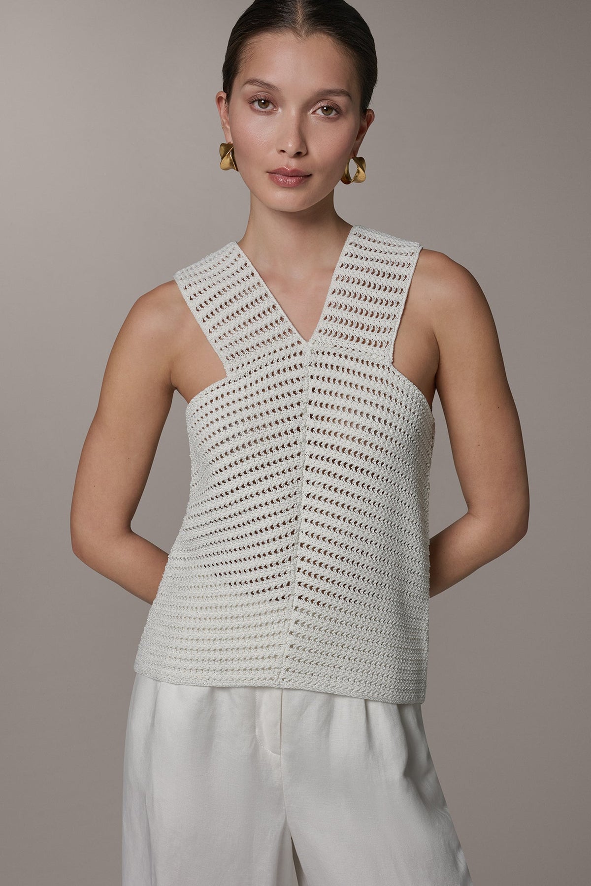 SLEEVELESS METALLIC SWEATER TANK