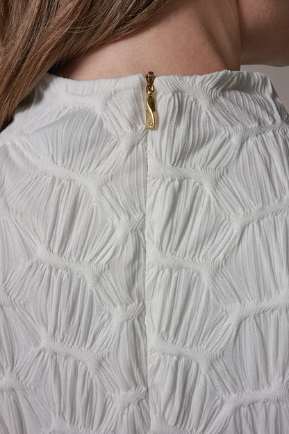SLEEVELESS MOCK NECK BLOUSE
