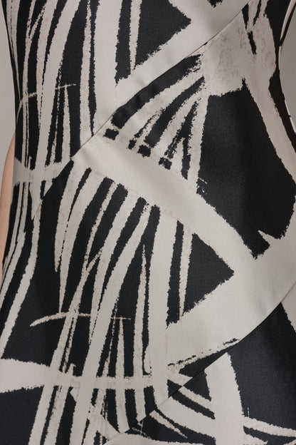 ASYMMETRIC MIDI SLIP DRESS