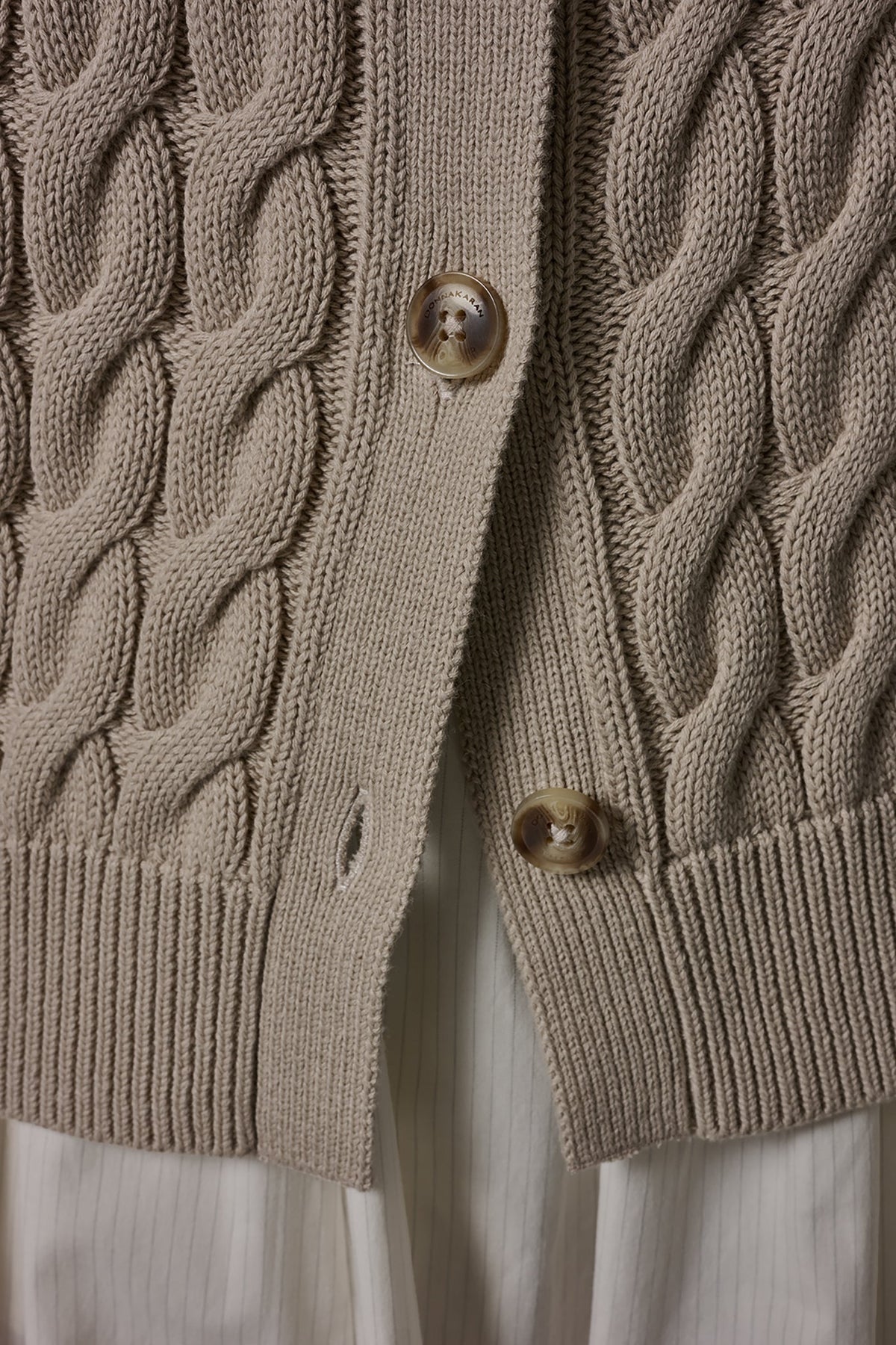 SLEEVELESS CABLE KNIT VEST