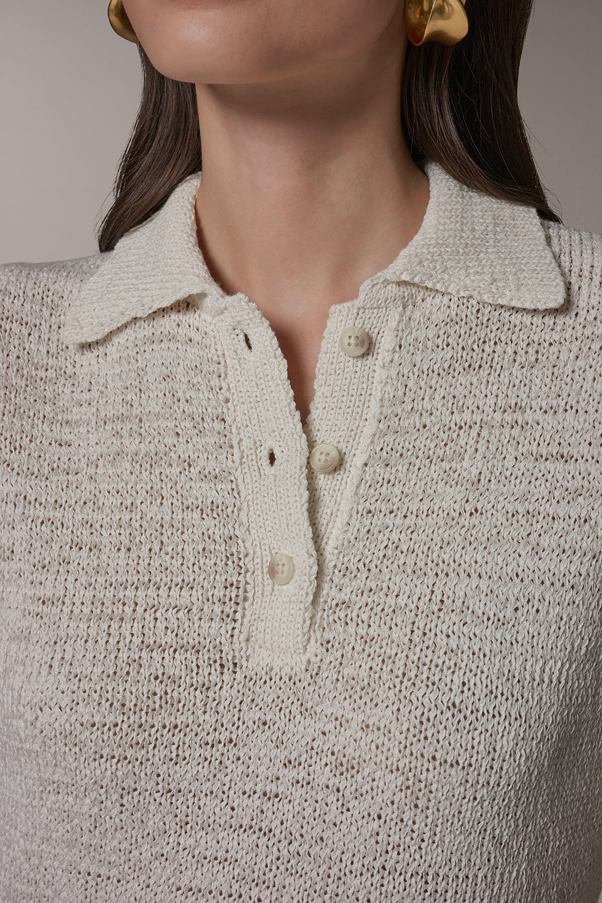 SLEEVELESS POLO SWEATER