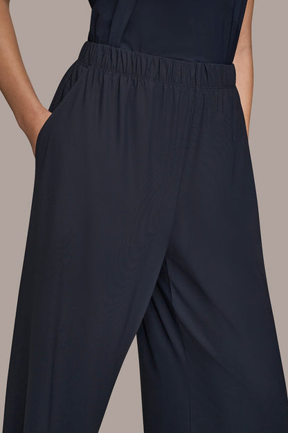 THE MODERN TRAVEL MID-RISE RELAXED ANKLE PANT