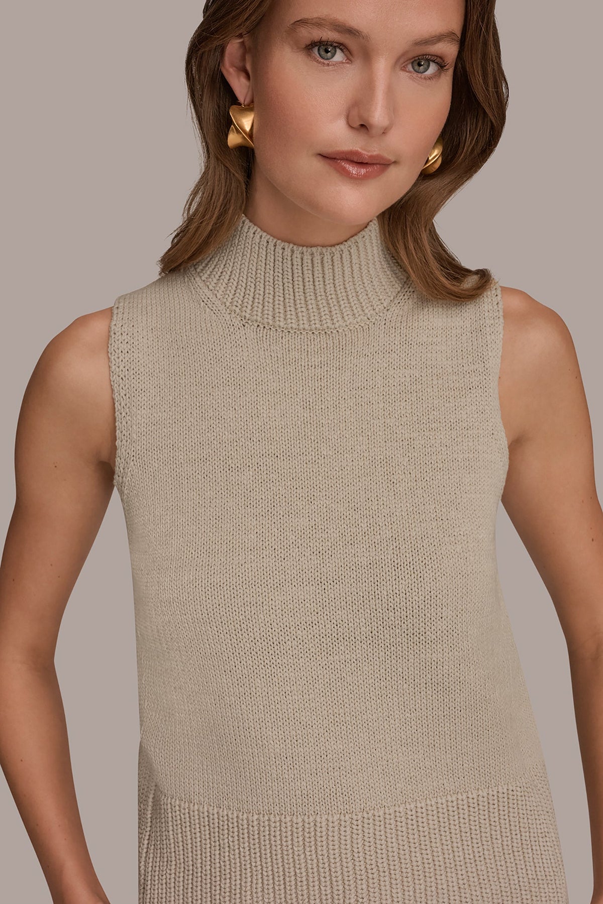 SLEEVELESS A-LINE SWEATER
