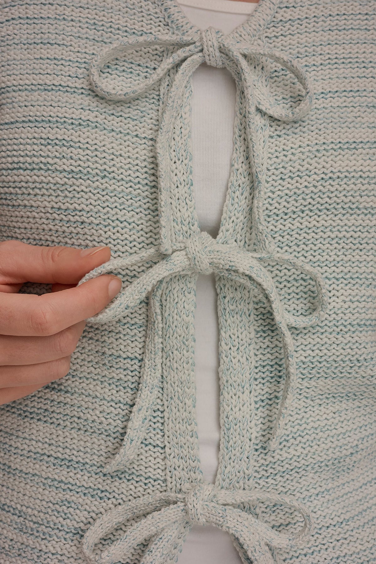 SLEEVELESS TIE-FRONT CARDIGAN