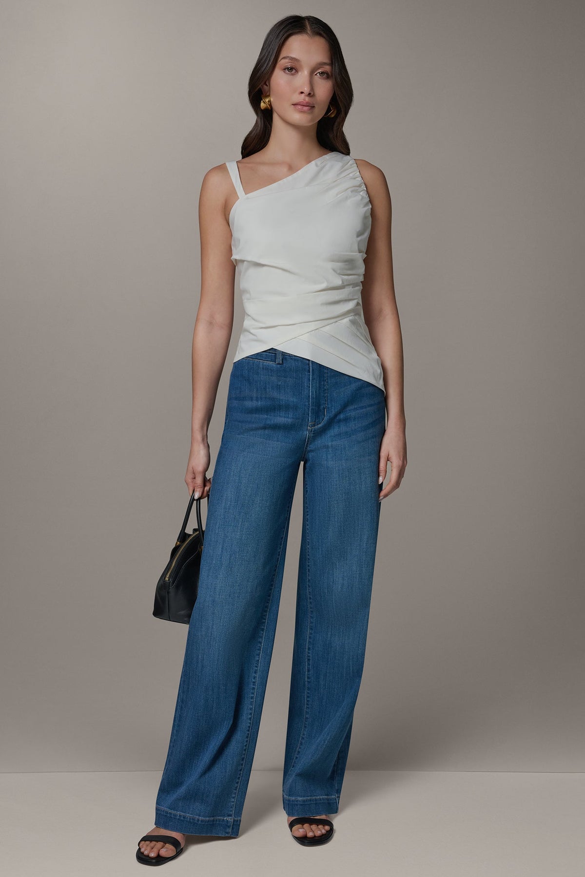 SLEEVELESS ASYMMETRIC BLOUSE