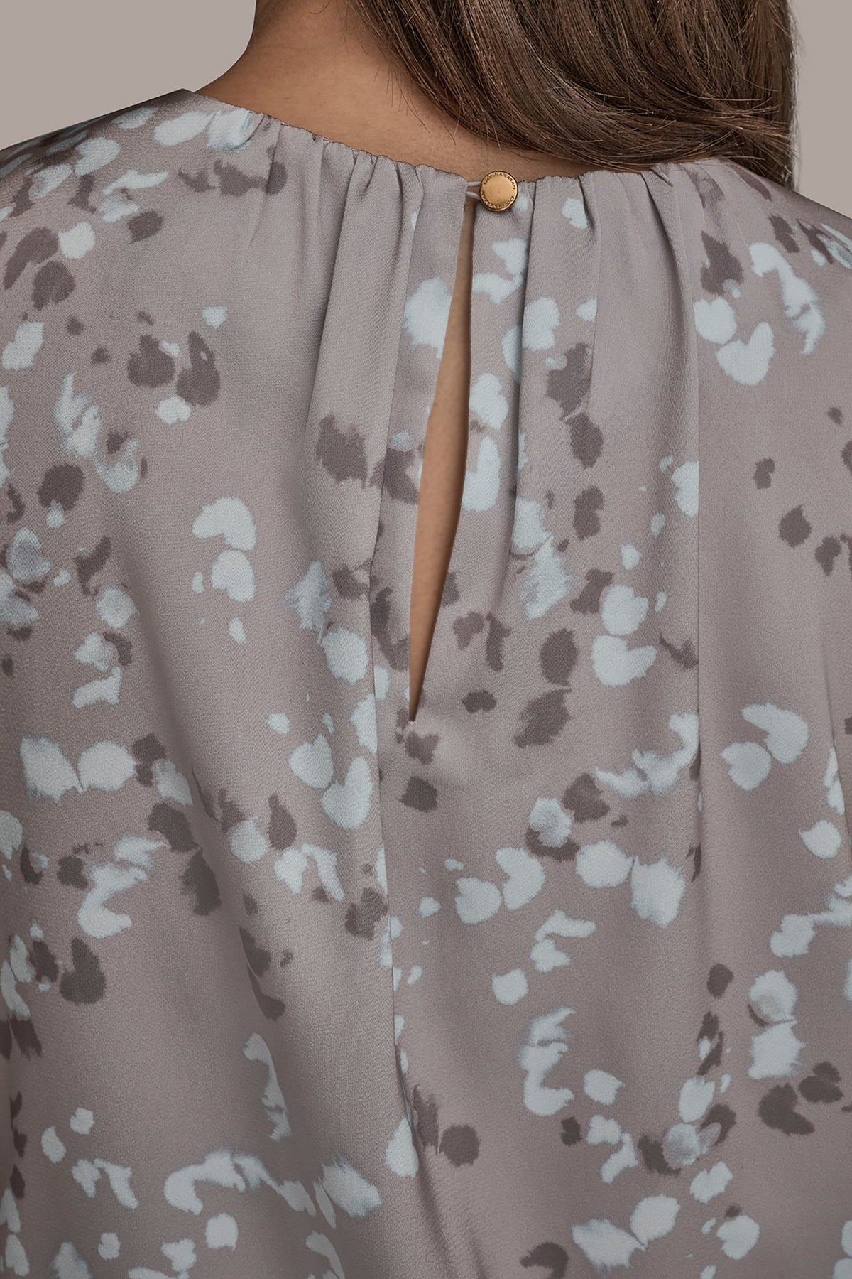FLORAL CAP SLEEVE TWIST BLOUSE